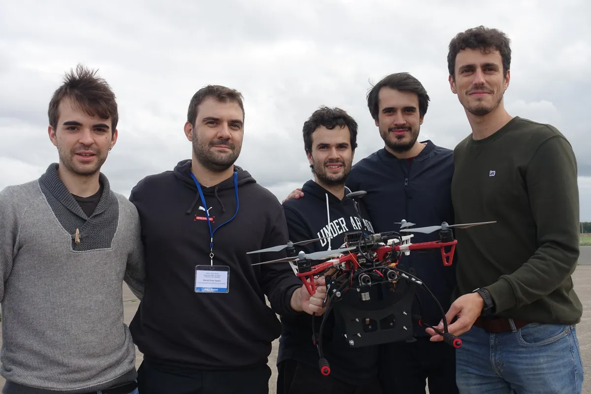 Team members with their drone at IMAV 2022